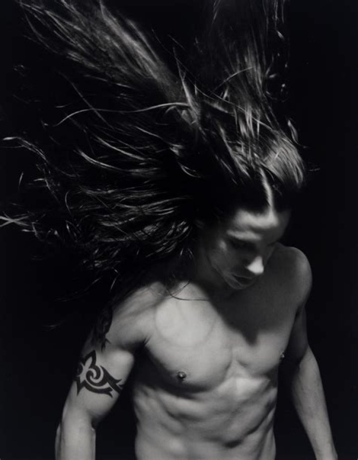 Anthony Kiedis by Sante D’Orazio God I hope that's a rose in his