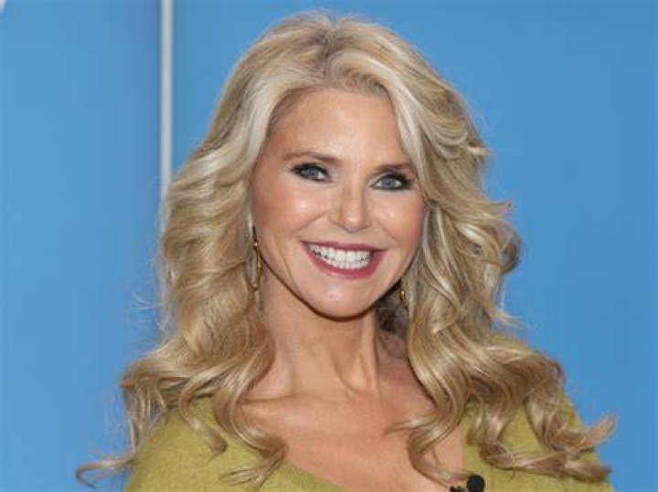 Christie Brinkley Rocks Pink Swimsuit That Shows Off Long Legs Photos