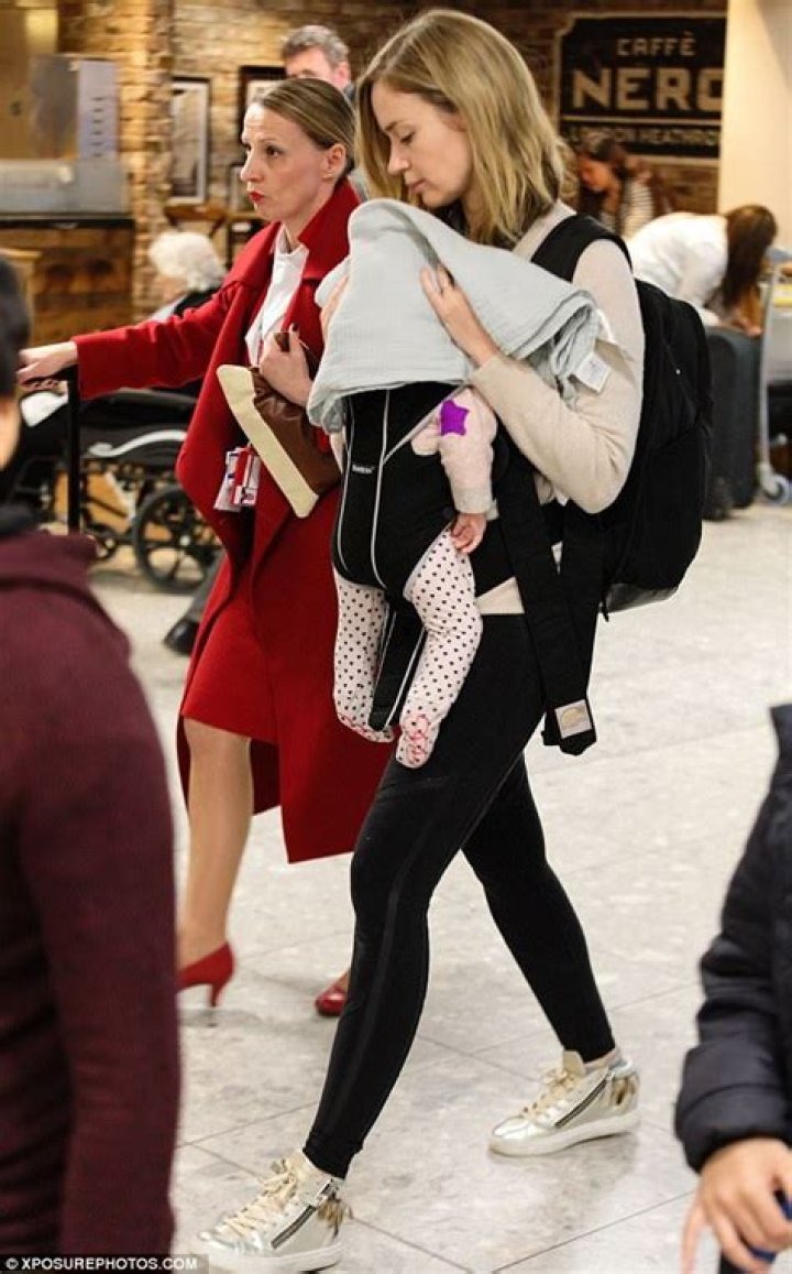 Doting mother Emily Blunt cradles baby daughter Violet Daily Mail Online