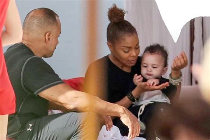 Jackson pictured feeding her baby son Eissa in Miami Beach, Florida