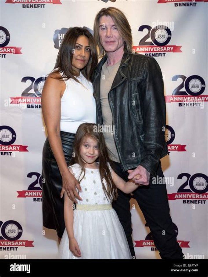 John Rzeznik (R), wife Meliana Gallo and daugher Liliana Carella
