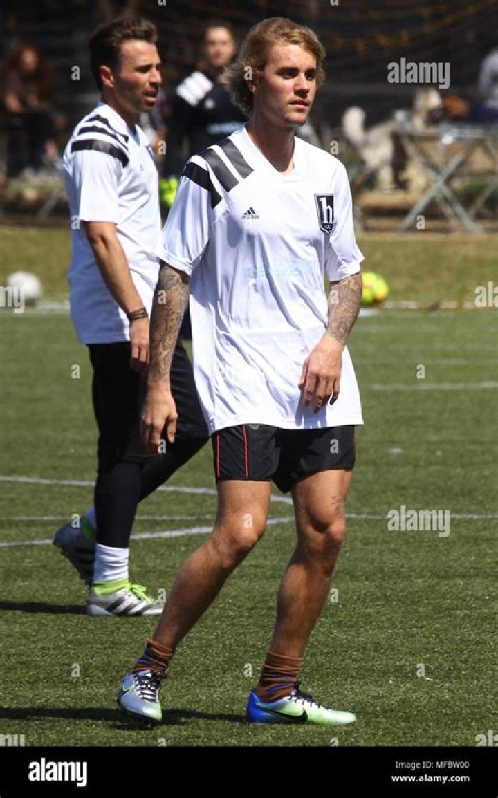 justin bieber playing soccer at starford, ontario field!! Justin