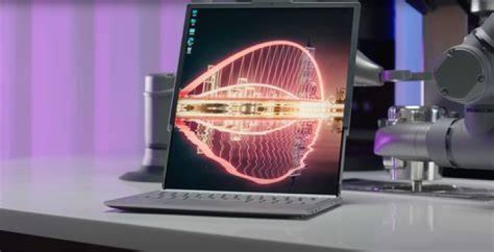 Lenovo demos laptop that rolls from 13 to 15 inches with the flip of a