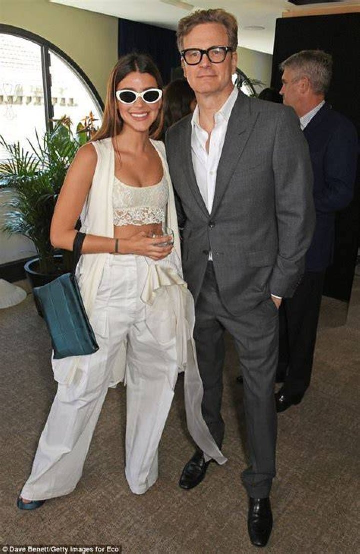 Livia Firth cuddles up to husband Colin on red carpet at Venice Film