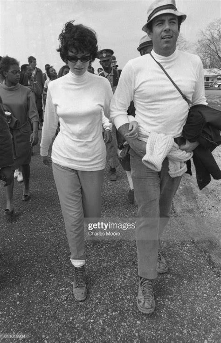Married American actors Judith and Pernell Roberts walk together