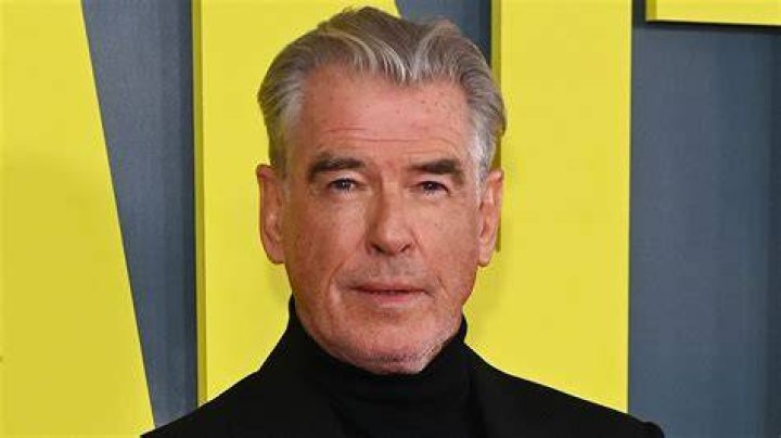 Pierce Brosnan is unrecognizable with long hair as he films scenes for