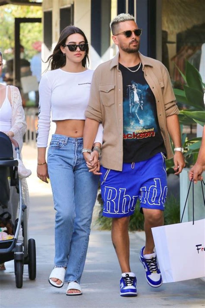 Scott Disick and Amelia Hamlin snuggle up on a boat