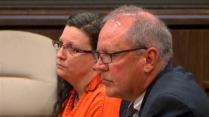 Woman sentenced for stealing identity to get bigger breast implants